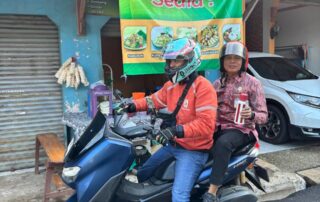 Kepala Dinas Disarpus Naik Angkutan Umum Hari Rabu